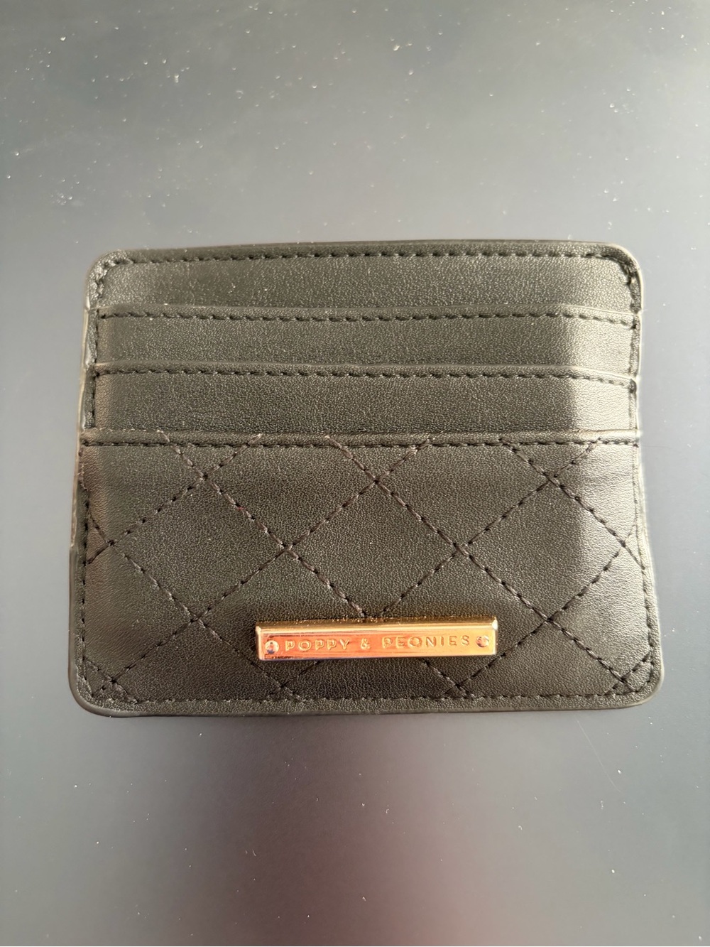 Poppy & Peonies Black Quilted Card Sleeve with Gold Logo